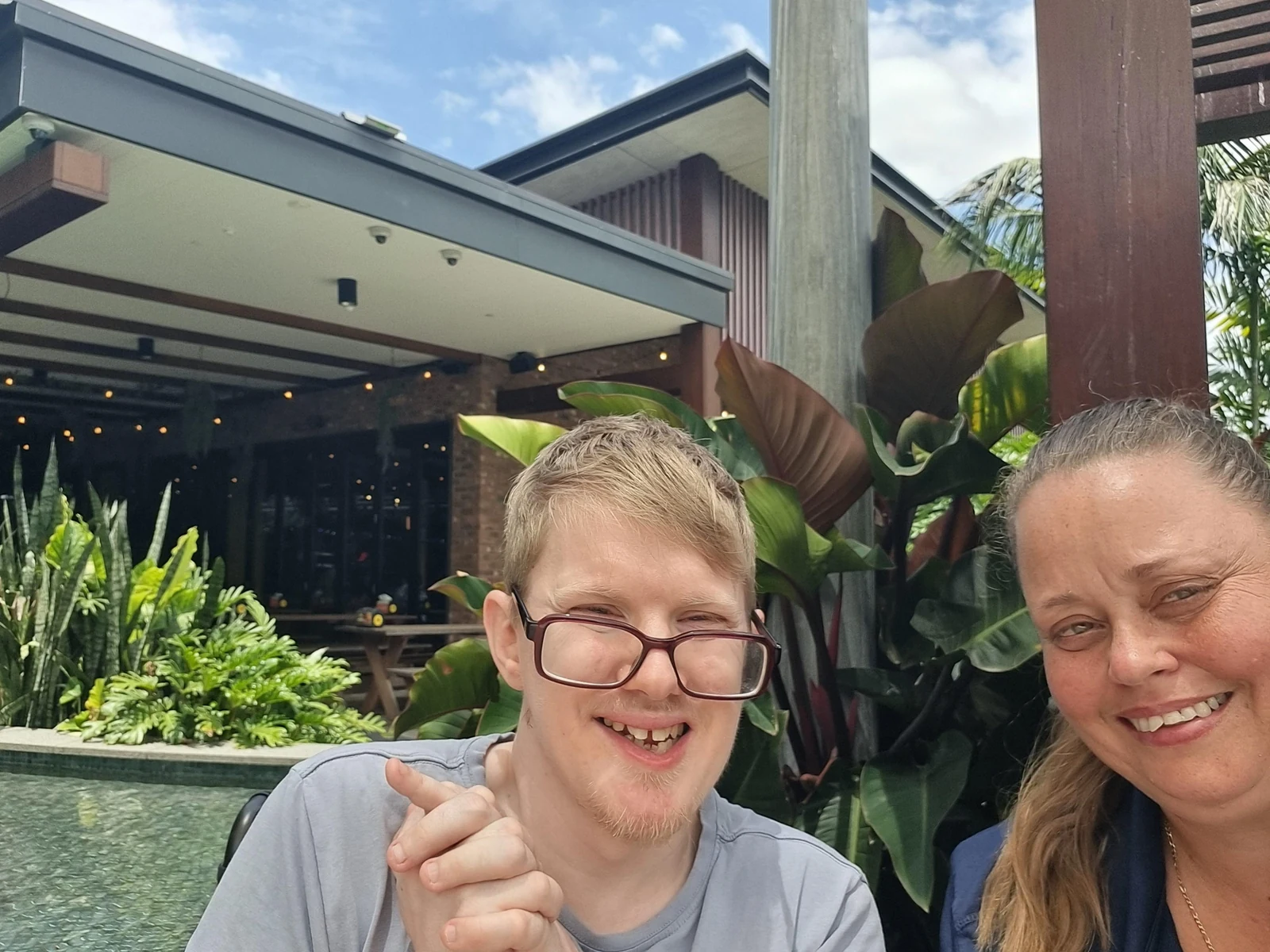 James enjoying an outing with a support worker