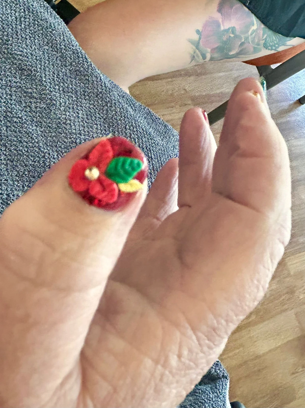 Hands showing festive nail designs