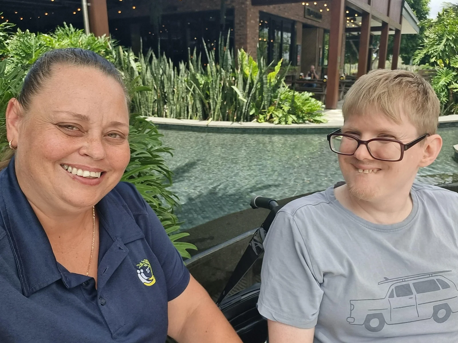 A community member enjoying an outing with a support worker
